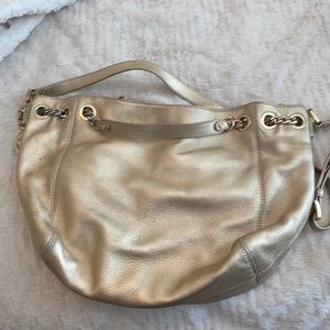 Michael Kors gold shoulder bag. Lightly used.